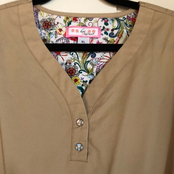 KOI scrub top. Washed but never worn. Size XL
